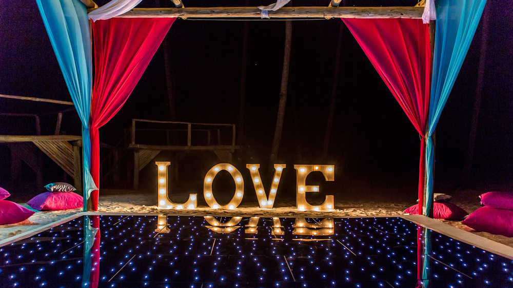 Illuminated dance floor with LOVE sign